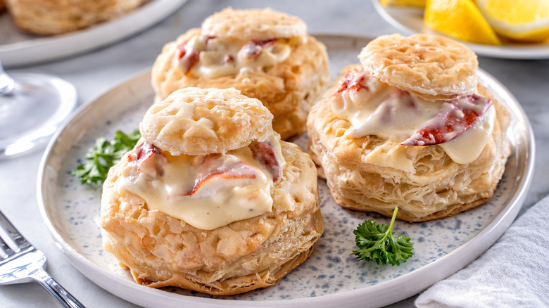 Plate of lobster Newburg served in puff pastry shells