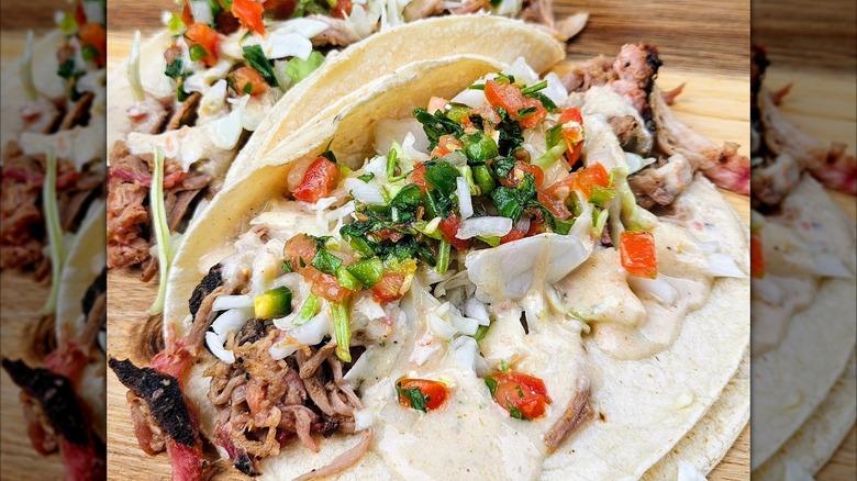 Pulled pork tacos with pico and sauce