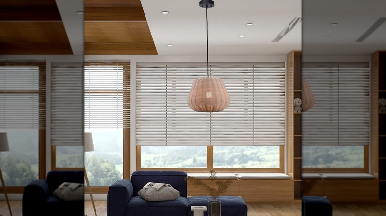 A rattan pendant light hanging in a living room