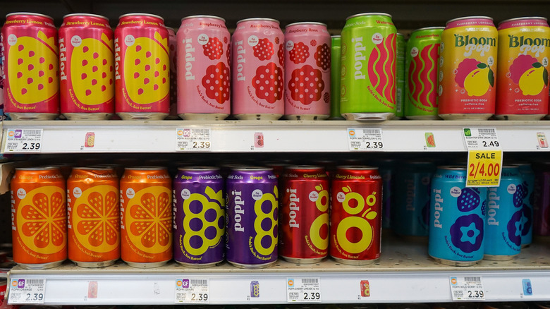 Grocery store shelf filled with prebiotic sodas