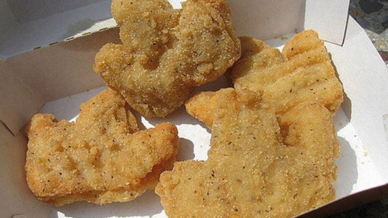 A box of four crown-shaped chicken nuggets from Burger King