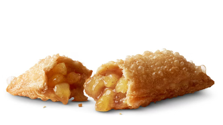 Fried apple pie against white background