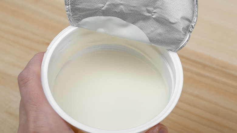 Open container of crème fraîche