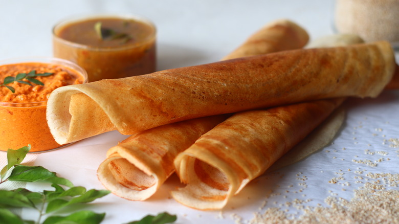 Pile of three Indian dosa crepes