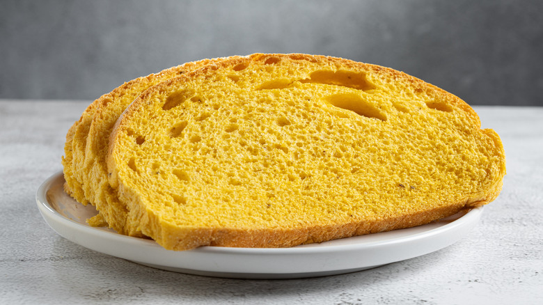 Sliced cornbread on a white plate