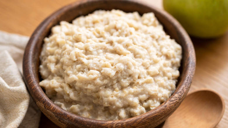 porridge in wooden bowl