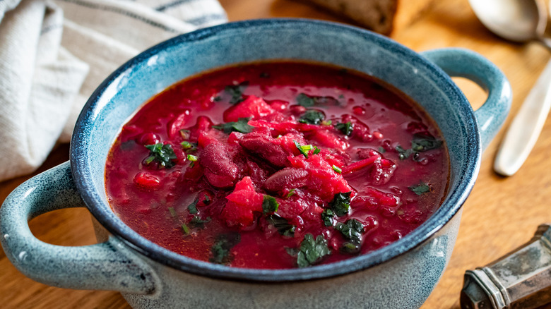 A bowl of borsch on a table