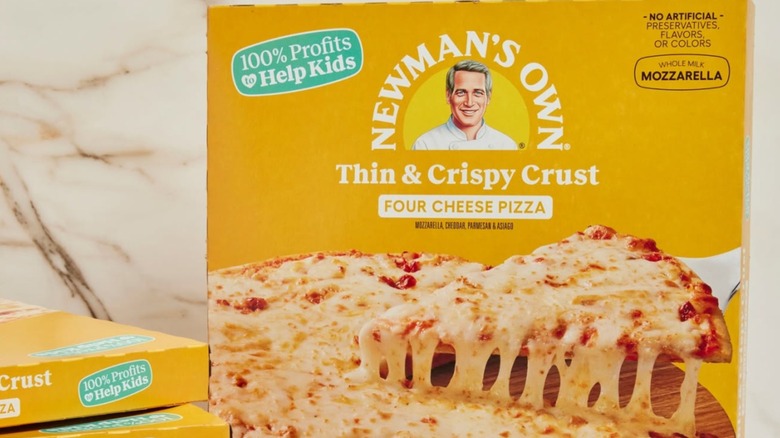 A box of Newman's Own Thin & Crispy Crust Four Cheese Pizza