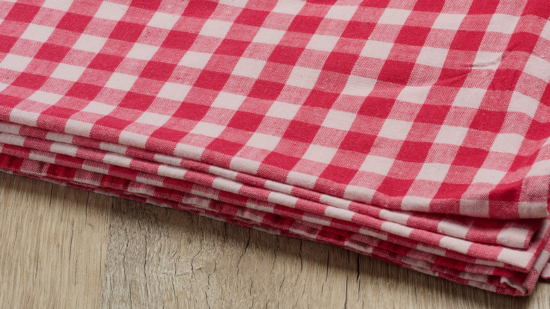 Close-up of a red gingham tablecloth, folded