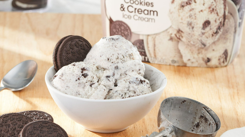 A bowl of Great Value Cookies & Cream ice cream garnished with an Oreo cookie