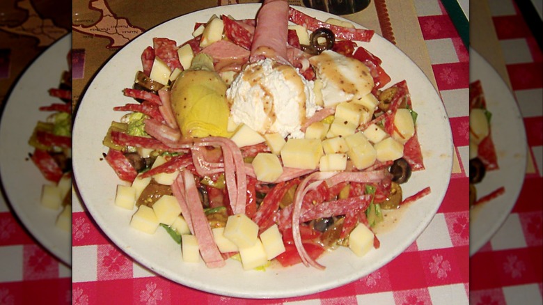Italian antipasto salad on white plate