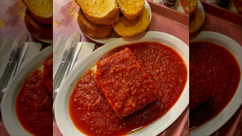 cafeteria tray with lasagna and Texas toast