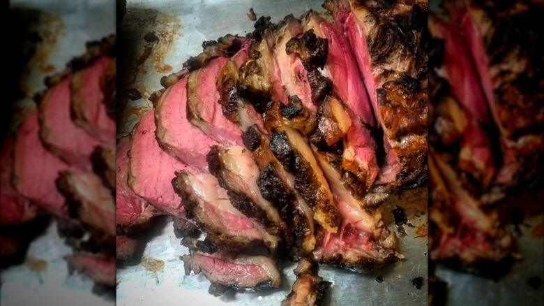 A close-up of sliced slow-cooked meat