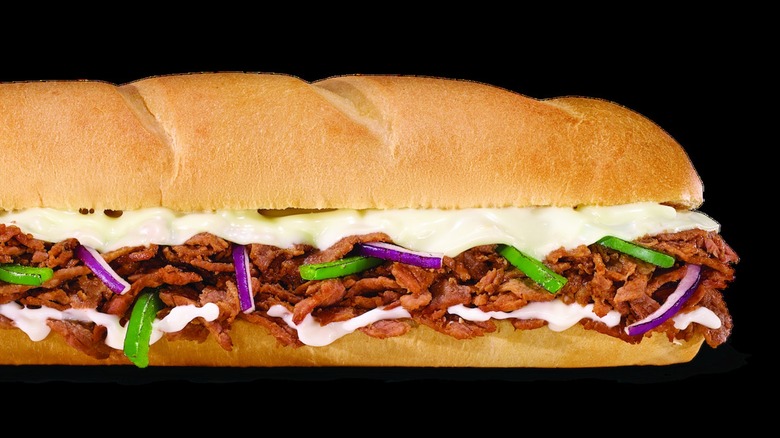 Subway's Footlong Philly Steak on black background