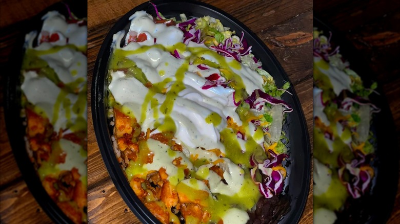 Taco Bell's Cantina Chicken Bowl on wood table
