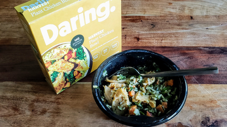 Daring Harvest Plant Chicken Bowl on wooden table with fork