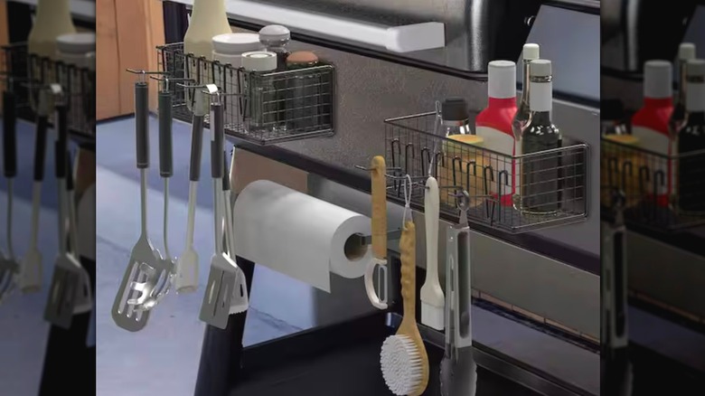 Anqtovp Magnetic Storage Bin and Paper Towel Holder filled with items
