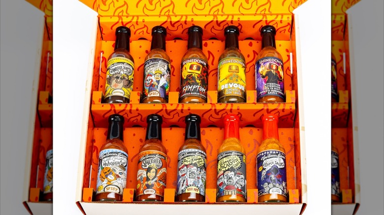 10 Torchbearer hot sauces arranged in a gift box