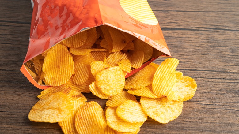 open potato chip bag on table