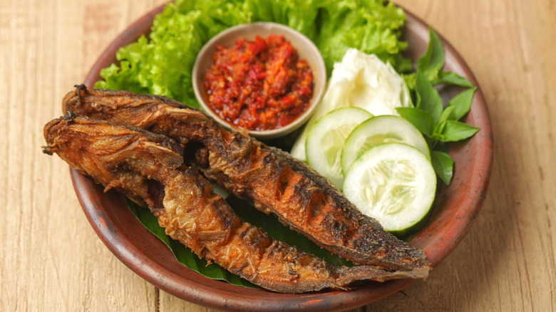 Pecel Lele Indonesian fried catfish dish with sambal and salad