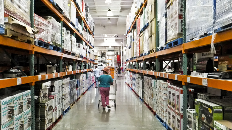 Woman walking through the aisles of Costco