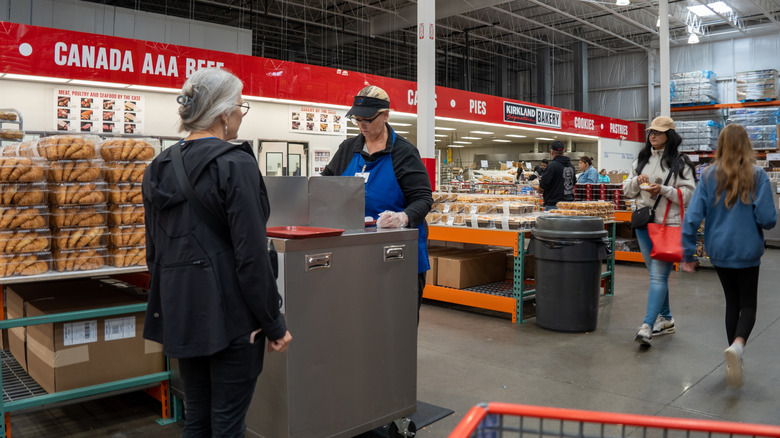 Costco employee handing out samples