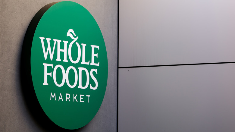 Whole Foods Market sign on grey building