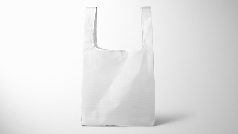 White plastic grocery bag on white background