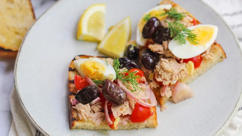 plate of Niçoise Toast with lemon