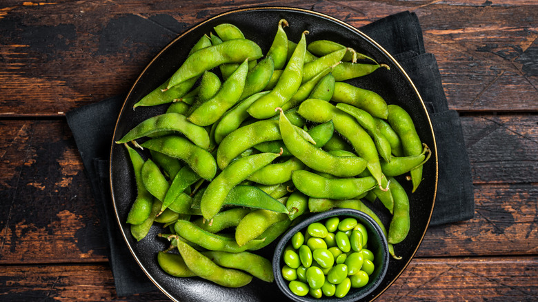 Bowl of edamame pods and shelled edamame