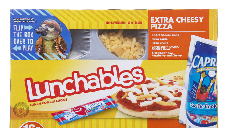 Unopened yellow Lunchables box on a white background