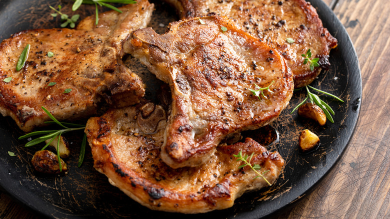 Cooked pork chops on a plate