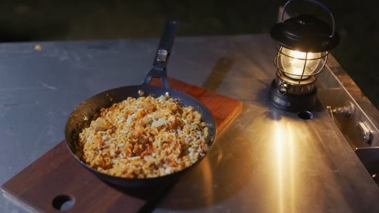 pan of Benes yfryed next to lamp