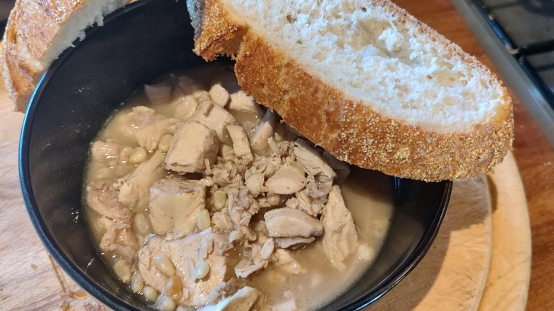 mirrored image of bowl of dillegrout in kitchen