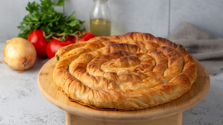 Borek on wooden cake stand