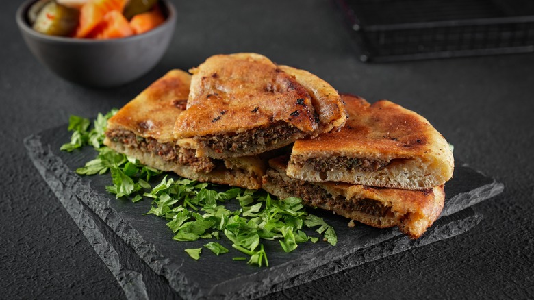 Hawawshi on slate board