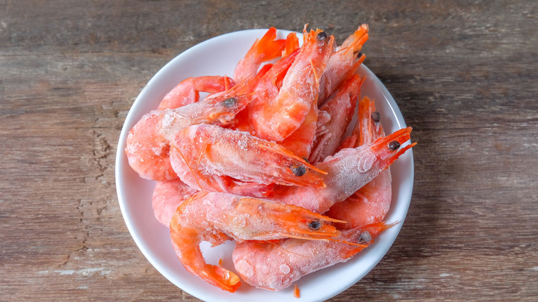 Frozen shrimp defrosting on counter top
