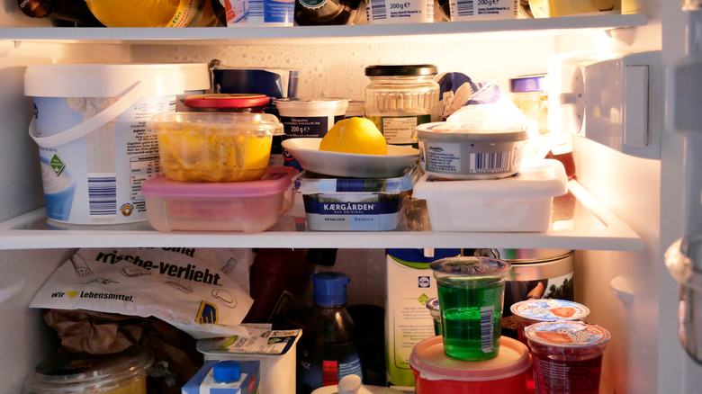 Refrigerator over-filled with food