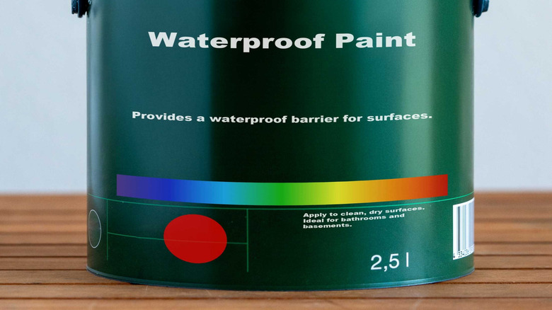 Can of waterproof paint against a white background