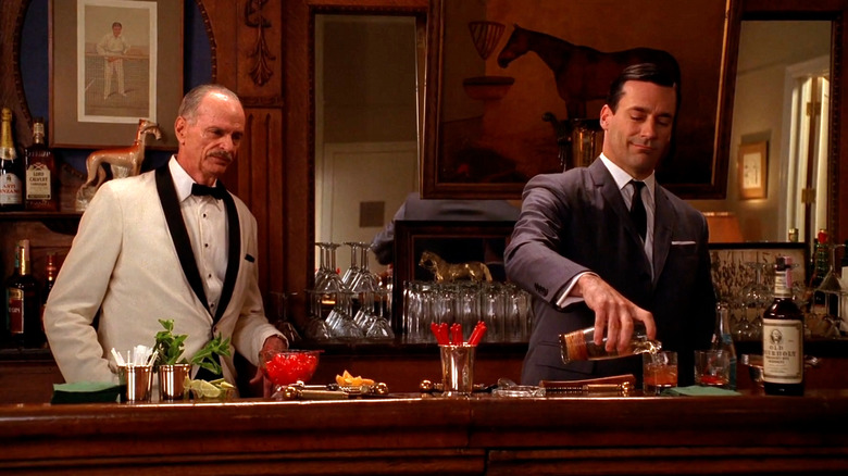 Don Draper making an old fashioned at a bar in Mad Men