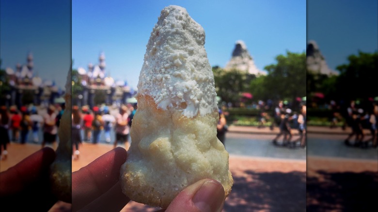 Matterhorn macaroon with hand in shot