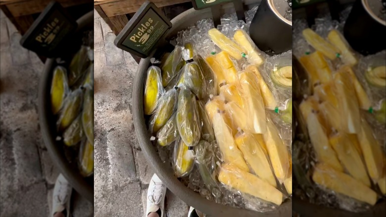 pickles next to pineapple spear