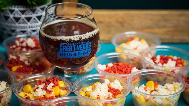 Great Vegas Festival of Beer mug and vegan snacks on tray