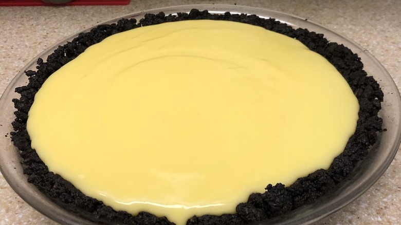 Blackbottom pie with Oreo crust on a glass plate