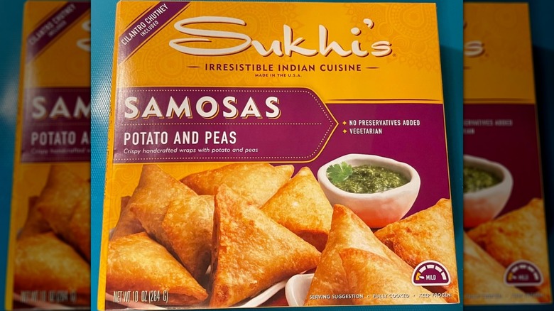 A box of Sukhi's Potato and Peas Samosas on a kitchen counter