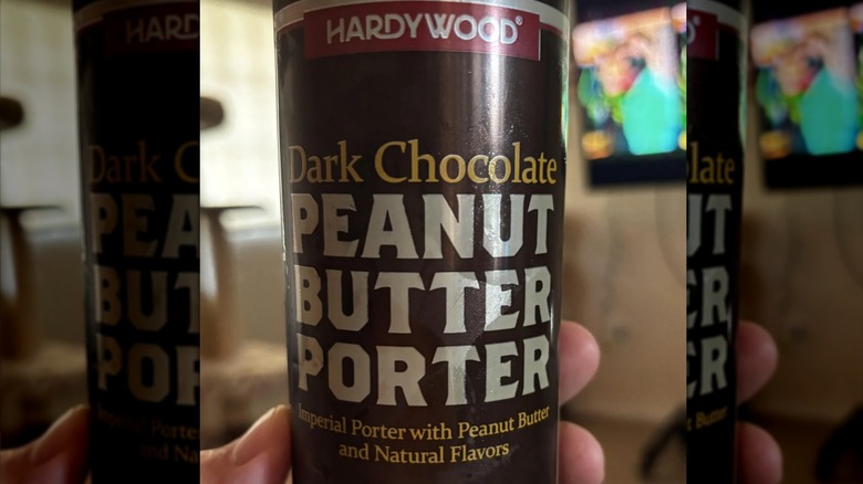 Someone holding a bottle of Hardywood Dark Chocolate Peanut Butter Porter