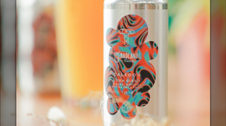 A can of Caledon beer with a swirly, colorful logo.