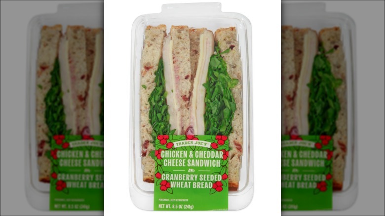 Chicken and cheddar cheese sandwich on white background