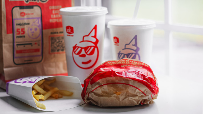 A table setting featuring a fast food order from Jack in the Box