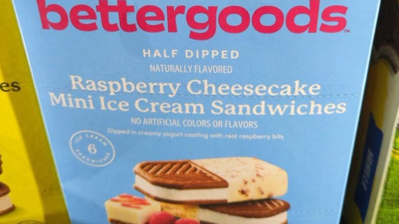 A box of bettergoods Half Dipped Raspberry Cheesecake Mini Ice Cream Sandwiches